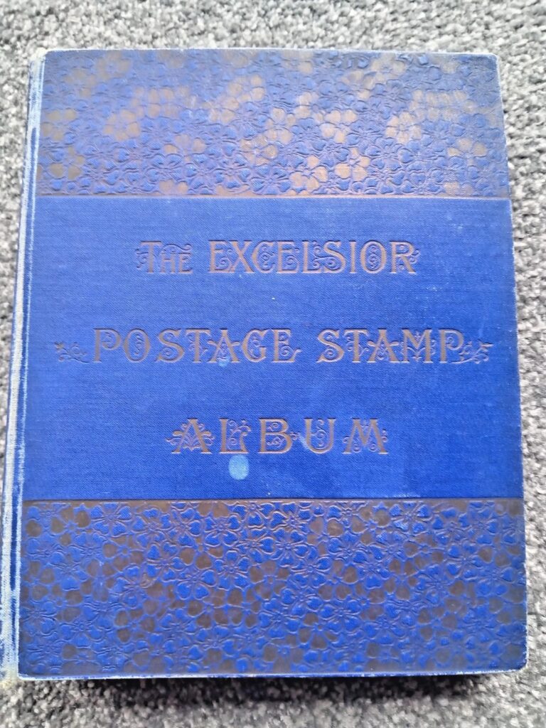Mixed World Stamp Collection in an Excelsior Postage Stamp Album